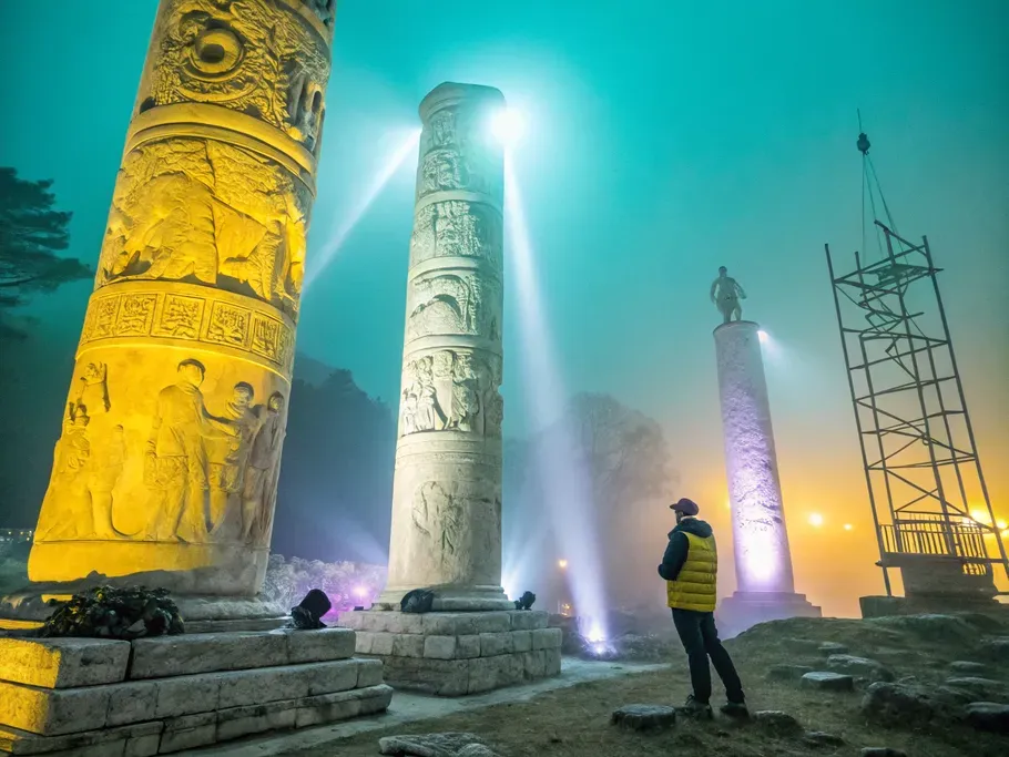 Three ancient marble pillars in a misty void, representing the components of a balance sheet: assets, liabilities, and equity.
