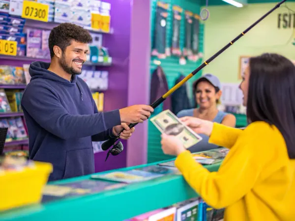Customer receiving a sales discount at the checkout